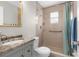 Clean bathroom with shower, granite vanity, and updated fixtures at 3131 Deltona Blvd, Spring Hill, FL 34606