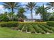 Entrance to Esplanade at Starkey Ranch with lush landscaping and manicured lawns at 3312 Francoa Dr, Odessa, FL 33556