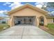 Attached garage with open door, offering ample storage space at 359 Portland Ave, Spring Hill, FL 34606