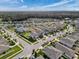 Aerial view of a residential neighborhood with houses at 3830 Gainer Springs Ave, New Port Richey, FL 34653