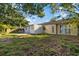 View of the home's backyard, showing the patio area at 4151 Hillsdale Dr, New Port Richey, FL 34652