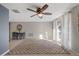 Living area with tiled floors, a ceiling fan, and patterned rug at 4151 Hillsdale Dr, New Port Richey, FL 34652