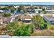 Aerial view of the house and surrounding neighborhood at 5461 Colchester Ave, Spring Hill, FL 34608
