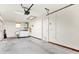 Attached garage with washer, dryer, and extra storage at 5461 Colchester Ave, Spring Hill, FL 34608