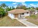 Front view of single-story home with driveway at 5461 Colchester Ave, Spring Hill, FL 34608