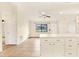 Open concept kitchen with breakfast bar and access to a patio at 5461 Colchester Ave, Spring Hill, FL 34608