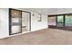 Spacious sunroom with access to the kitchen and backyard at 5461 Colchester Ave, Spring Hill, FL 34608