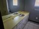 Bathroom with double vanity and bathtub at 6141 Freeport Dr, Spring Hill, FL 34606