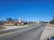 View down a road with businesses and buildings visible at 6141 Freeport Dr, Spring Hill, FL 34606