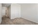 Spacious bedroom with neutral-toned carpeting and ample closet space at 628 Cleveland St # 1503, Clearwater, FL 33755