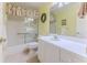 Clean bathroom with a shower/tub combo and a large vanity at 7425 Nature Walk Dr, Spring Hill, FL 34606