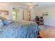 Primary bedroom with en-suite bath and home office area at 7425 Nature Walk Dr, Spring Hill, FL 34606