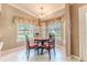 Charming breakfast nook with a round table and four chairs at 7425 Nature Walk Dr, Spring Hill, FL 34606