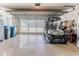 Bright garage with golf cart and storage space at 7425 Nature Walk Dr, Spring Hill, FL 34606