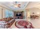 Spacious Gathering room with ample natural light and comfortable furniture at 7425 Nature Walk Dr, Spring Hill, FL 34606