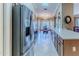Large kitchen with stainless steel appliances and breakfast bar at 7425 Nature Walk Dr, Spring Hill, FL 34606