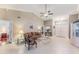 Spacious living area with vaulted ceiling and tile flooring at 7425 Nature Walk Dr, Spring Hill, FL 34606