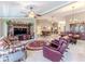 Open living room showcasing a large TV and comfortable seating at 7425 Nature Walk Dr, Spring Hill, FL 34606