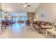 Open concept living and dining area with tile floors at 7425 Nature Walk Dr, Spring Hill, FL 34606