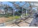 Enjoyable screened patio overlooking backyard at 7425 Nature Walk Dr, Spring Hill, FL 34606