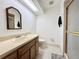 Clean bathroom with shower stall, toilet, and vanity at 7805 Radcliffe Cir # 7805, Port Richey, FL 34668