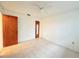 Spacious bedroom with tile floors and ample closet space at 7805 Radcliffe Cir # 7805, Port Richey, FL 34668