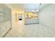 Dining area with access to kitchen and entryway at 7805 Radcliffe Cir # 7805, Port Richey, FL 34668