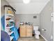 Pool bathroom with toilet, sink, and storage at 7815 Tanglewood Dr, New Port Richey, FL 34654
