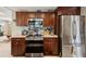 Modern kitchen with stainless steel appliances and granite countertops at 7815 Tanglewood Dr, New Port Richey, FL 34654