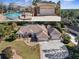 Single-story home with pool, detached garage, and landscaped yard at 10124 Southern Breeze Ct, Weeki Wachee, FL 34613