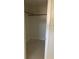 Large bedroom closet with shelving for storage at 10929 Premier Ave, Port Richey, FL 34668