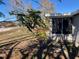 Side of house with screened porch at 10929 Premier Ave, Port Richey, FL 34668