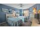 Guest bedroom with twin beds, ceiling fan, and plenty of natural light at 11445 Orleans Ln, Port Richey, FL 34668