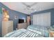 Second bedroom with twin beds, dresser, and access to a shared bath at 11445 Orleans Ln, Port Richey, FL 34668