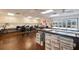 Craft room with tables, chairs, and storage for community activities at 11445 Orleans Ln, Port Richey, FL 34668