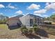 Single-Gathering home with a screened pool and lush landscaping at 14017 Spring Hill Dr, Spring Hill, FL 34609