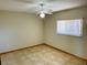 Spacious bedroom with ceiling fan and tile flooring at 15131 Eastwood Trl, Brooksville, FL 34604