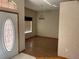 Simple dining room with wood flooring and light walls at 15131 Eastwood Trl, Brooksville, FL 34604