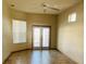 Gathering room with tile flooring and sliding glass doors at 15131 Eastwood Trl, Brooksville, FL 34604