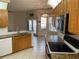 Kitchen with granite countertops and oak cabinets at 15131 Eastwood Trl, Brooksville, FL 34604