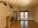 Living room with wood flooring and sliding glass doors at 15131 Eastwood Trl, Brooksville, FL 34604