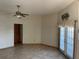 Living room with french doors leading outside and tile floors at 15131 Eastwood Trl, Brooksville, FL 34604