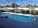 Refreshing kidney-shaped pool with screened enclosure at 15131 Eastwood Trl, Brooksville, FL 34604