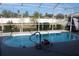 Relaxing kidney-shaped pool with screened enclosure at 15131 Eastwood Trl, Brooksville, FL 34604