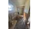 Bathroom under renovation with exposed walls and flooring at 16204 Blackbeard Ln, Hudson, FL 34667