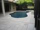 Inviting freeform pool and spa at 1855 Eau Claire Ct, Oldsmar, FL 34677