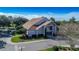 Exterior view of community building with large windows at 2341 Masters Ct, Spring Hill, FL 34606