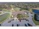 Clubhouse and tennis courts aerial view at 2595 Royal Liverpool Dr, Tarpon Springs, FL 34688
