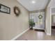 Bright entryway with tile floors at 2595 Royal Liverpool Dr, Tarpon Springs, FL 34688