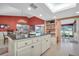 Modern kitchen with granite island and stainless steel appliances at 2595 Royal Liverpool Dr, Tarpon Springs, FL 34688